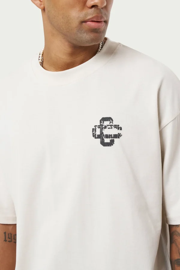 The Couture Club T-Shirts-Cracked Print Emblem Relaxed T-Shirt
