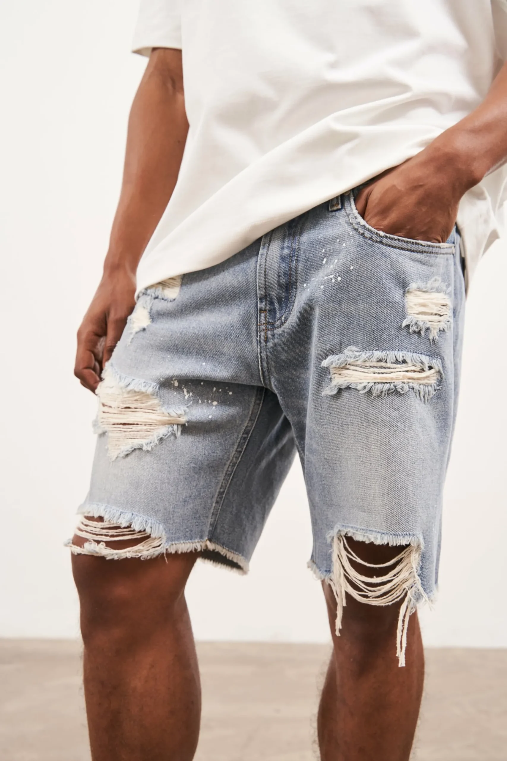 distressed_raw_hem_denim__4-1.webp The Couture Club Shorts-Distressed Raw Hem Denim Shorts