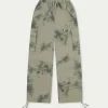 The Couture Club Bottoms-Draped Camo Oversized Cargos