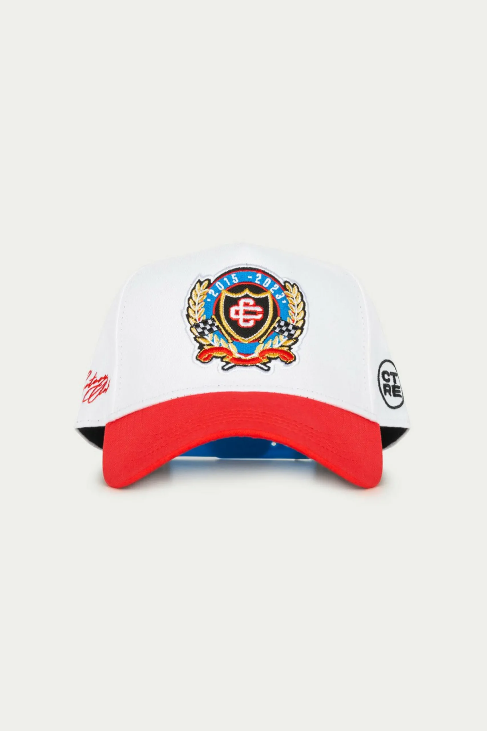 emblem_anniversary_badged_1.webp The Couture Club Caps & Hats-Emblem Anniversary Badged Cap