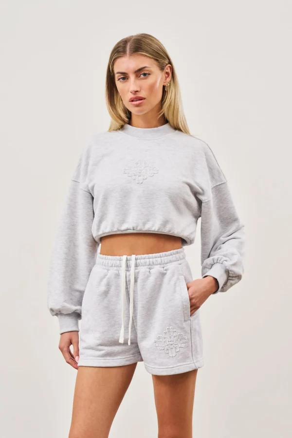 The Couture Club Sweatshirts-Emblem Applique Crop Sweatshirt