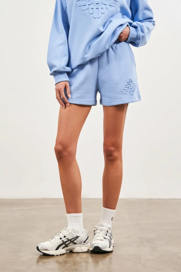 The Couture Club Shorts-Emblem Embossed Shorts