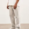 The Couture Club Bottoms-Emblem Side Panel Split Hem Joggers