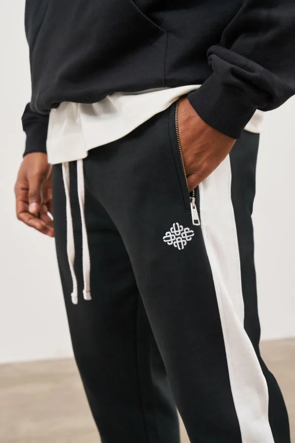 The Couture Club Bottoms-Emblem Side Panel Split Hem Joggers