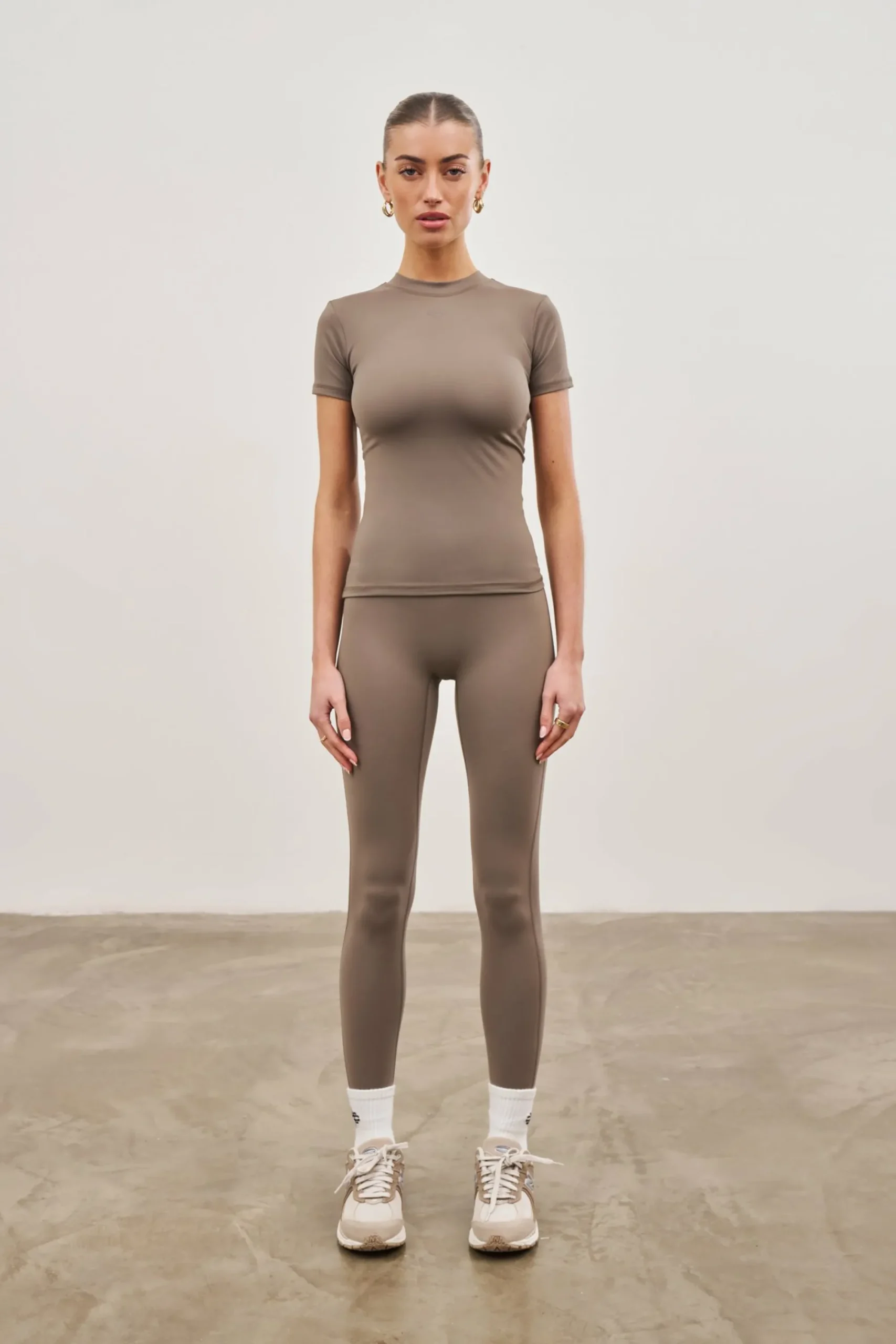 sculpting_stretch_emblem__2-3.webp The Couture Club Tops-Sculpting Stretch Emblem Baby Tee